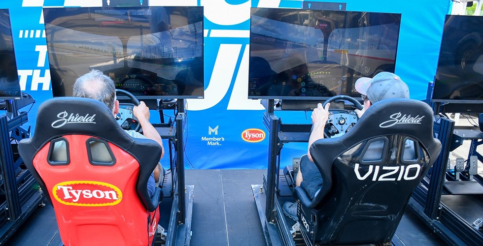 INDYCAR fans enjoy virtual racing at a Sam's Club sponsored event.